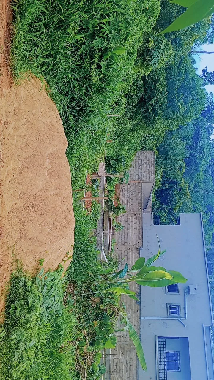 WhatsApp Image 2026-06-14 at 08.11.04 TERRAIN TITRE DE 726m² EN VENTE À NYOM !